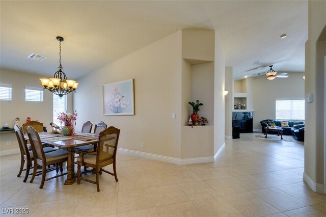 9524 Tyler Rose St, Las Vegas, NV 89178 - dining space featuring a chandelier, ceiling fan, baseboards, built in features, and light tile patterned floors