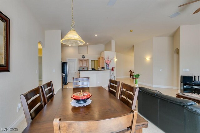 9524 Tyler Rose St, Las Vegas, NV 89178 - dining area with arched walkways, a ceiling fan, baseboards, and recessed lighting