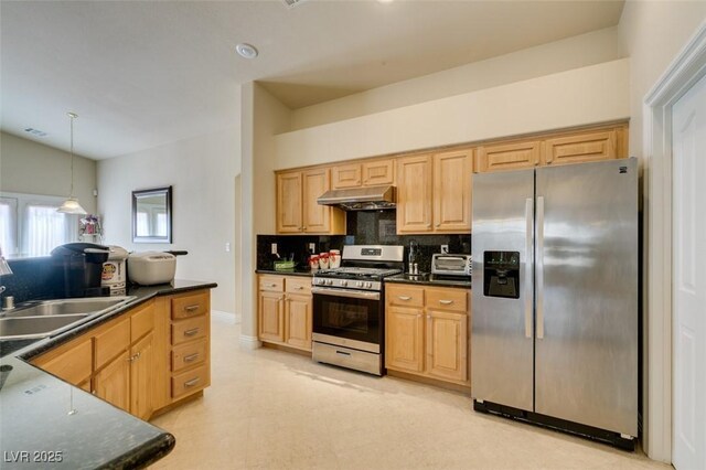 9524 Tyler Rose St, Las Vegas, NV 89178 - kitchen featuring stainless steel appliances, under cabinet range hood, dark countertops, and tasteful backsplash