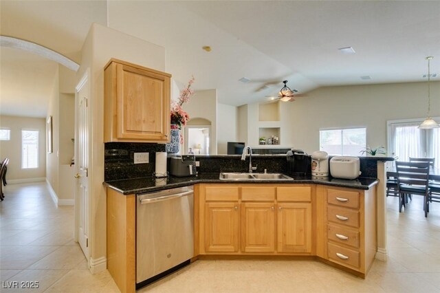 9524 Tyler Rose St, Las Vegas, NV 89178 - kitchen featuring dishwasher, a sink, a ceiling fan, dark stone counters, and decorative backsplash