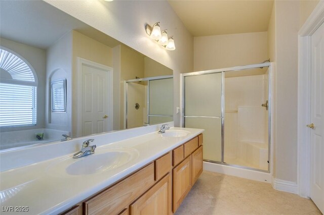 9524 Tyler Rose St, Las Vegas, NV 89178 - bathroom with a shower stall, double vanity, and tile patterned floors