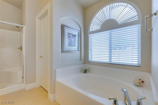 9524 Tyler Rose St, Las Vegas, NV 89178 - full bathroom featuring a bath and a shower stall