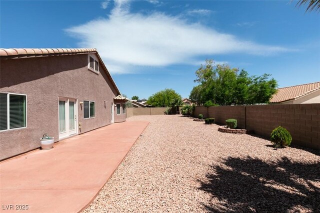 9524 Tyler Rose St, Las Vegas, NV 89178 - fenced backyard with a patio