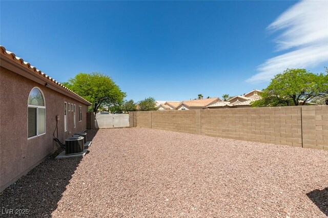 9524 Tyler Rose St, Las Vegas, NV 89178 - fenced backyard with cooling unit