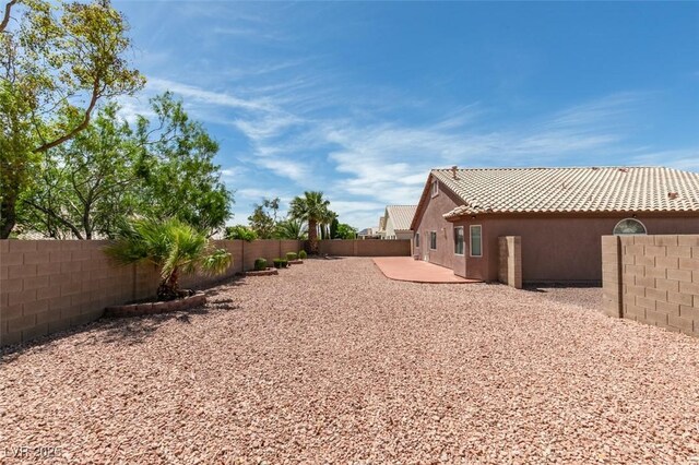 9524 Tyler Rose St, Las Vegas, NV 89178 - fenced backyard featuring a patio area