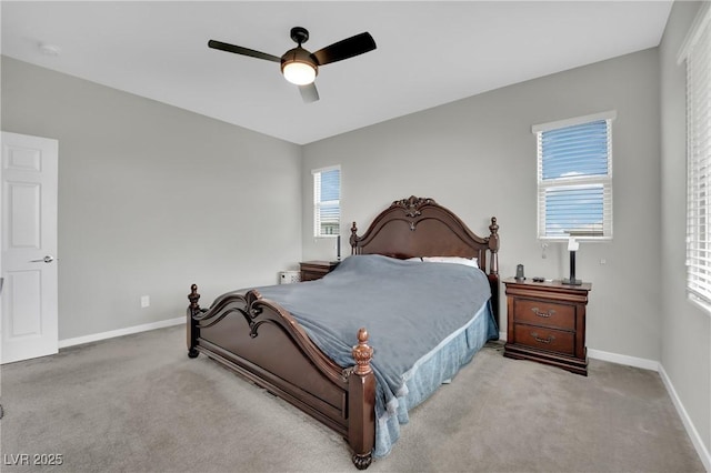 bedroom featuring carpet floors, baseboards, and a ceiling fan