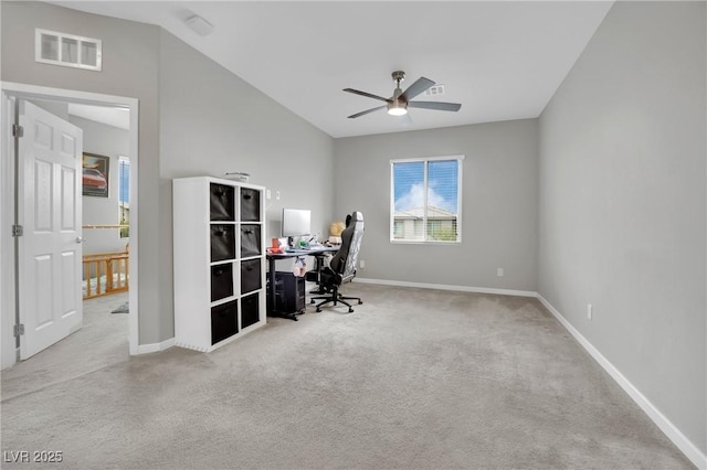 office space with a ceiling fan, carpet floors, and baseboards