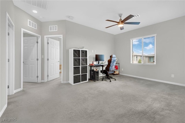 carpeted office with baseboards and ceiling fan