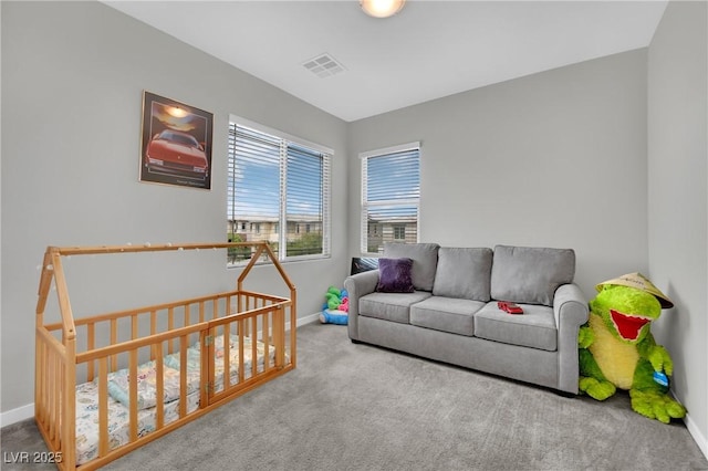 bedroom featuring carpet flooring and baseboards