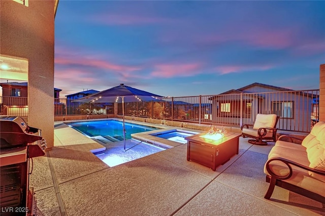 pool at dusk with a patio, a fenced backyard, a fire pit, and an in-ground hot tub