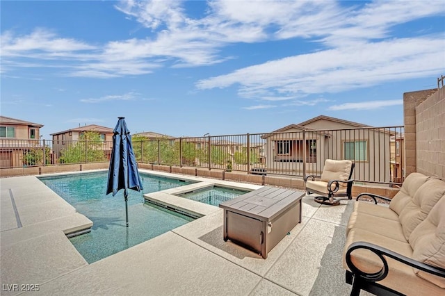 view of swimming pool with a patio area, a fenced backyard, outdoor lounge area, and a pool with connected hot tub