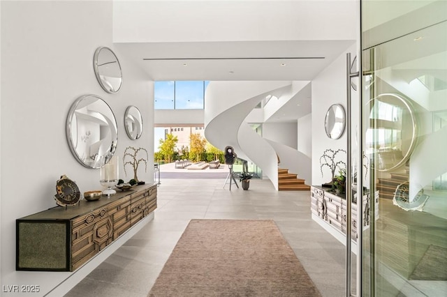 13 Rockstream Dr, Henderson, NV 89012 - foyer with a high ceiling, stairway, and tile patterned floors