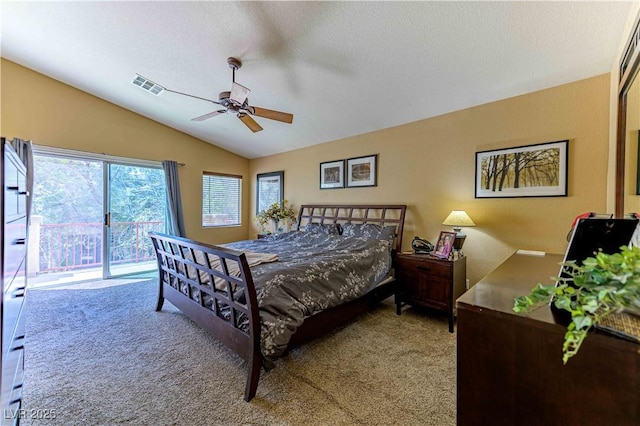 bedroom with access to exterior, carpet flooring, vaulted ceiling, ceiling fan, and a textured ceiling