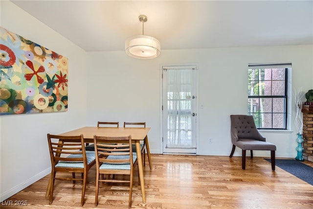 5576 W Rochelle Ave Unit 27C, Las Vegas, NV 89103 - dining room featuring light wood finished floors and baseboards