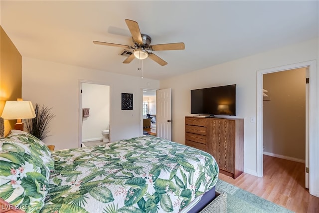 5576 W Rochelle Ave Unit 27C, Las Vegas, NV 89103 - bedroom featuring light wood-style floors, a ceiling fan, and baseboards