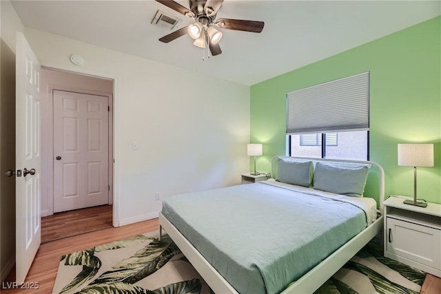 5576 W Rochelle Ave Unit 27C, Las Vegas, NV 89103 - bedroom featuring light wood-type flooring, baseboards, and a ceiling fan
