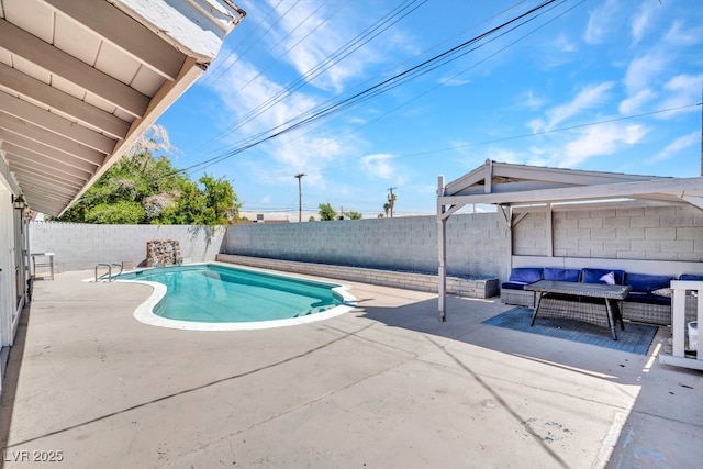 view of pool with an outdoor hangout area, a patio area, and a fenced backyard