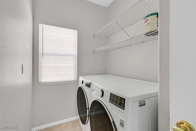 1221 Diamond Valley St, Henderson, NV 89052 - laundry area featuring washing machine and clothes dryer, baseboards, and light tile patterned floors