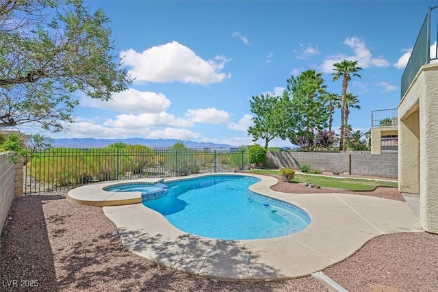 1221 Diamond Valley St, Henderson, NV 89052 - view of swimming pool featuring a fenced backyard, a pool with connected hot tub, and a patio