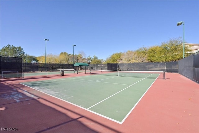 1221 Diamond Valley St, Henderson, NV 89052 - view of tennis court featuring fence and community basketball court