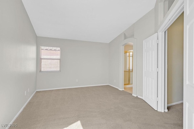 1221 Diamond Valley St, Henderson, NV 89052 - unfurnished bedroom featuring arched walkways, carpet flooring, and baseboards