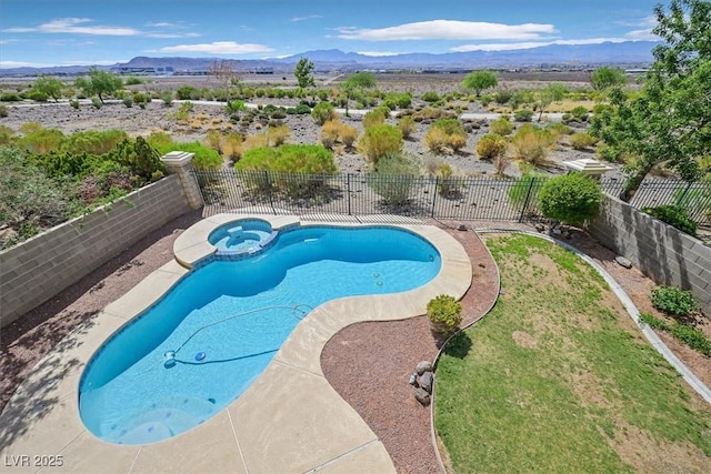 1221 Diamond Valley St, Henderson, NV 89052 - view of pool featuring a fenced backyard, a mountain view, and a pool with connected hot tub