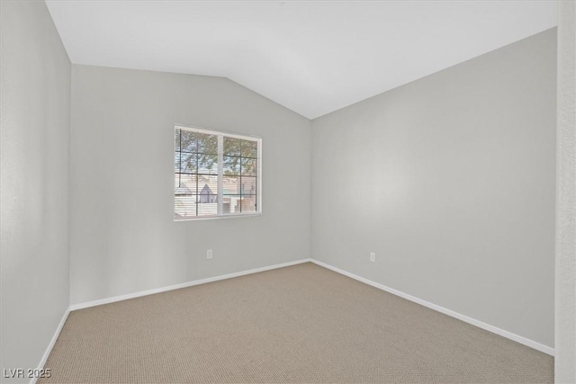 1221 Diamond Valley St, Henderson, NV 89052 - unfurnished room with carpet floors, vaulted ceiling, and baseboards