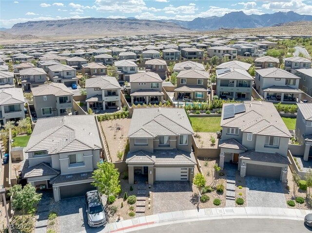 12429 Alpenglow Ct, Las Vegas, NV 89138 - aerial view of residential area with a mountain backdrop