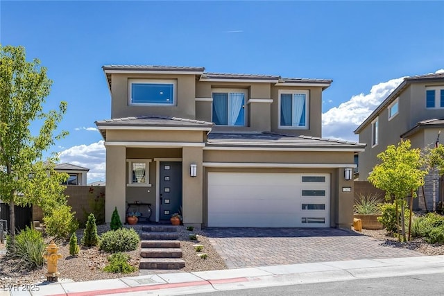 12429 Alpenglow Ct, Las Vegas, NV 89138 - prairie-style house featuring a garage, stucco siding, driveway, and a tiled roof