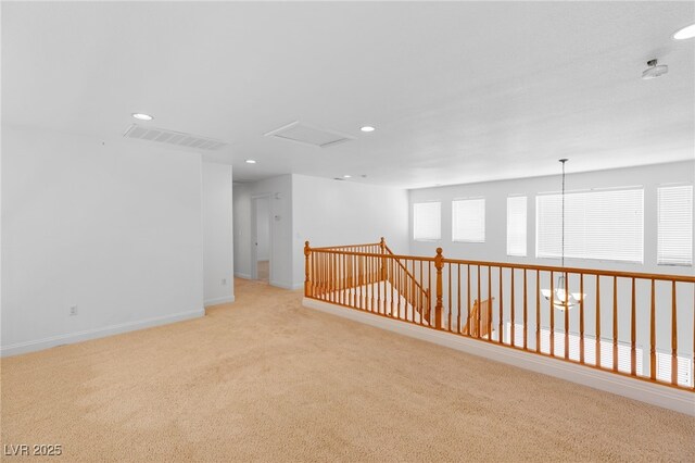 5396 Valley Wells Way, Las Vegas, NV 89113 - empty room with light colored carpet, recessed lighting, baseboards, and healthy amount of natural light