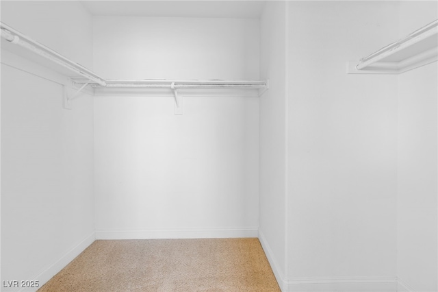 5396 Valley Wells Way, Las Vegas, NV 89113 - spacious closet featuring carpet floors