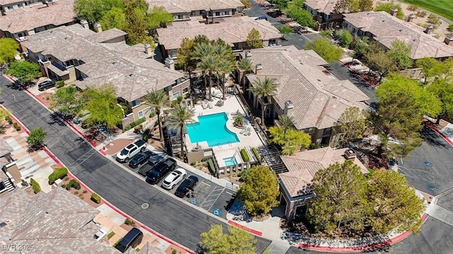 701 Peachy Canyon Cir Unit 201, Las Vegas, NV 89144 - aerial perspective of suburban area featuring a pool area