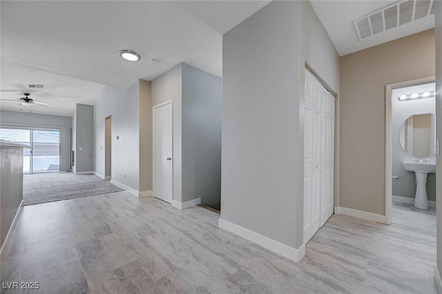 701 Peachy Canyon Cir Unit 201, Las Vegas, NV 89144 - hallway featuring baseboards