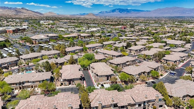 701 Peachy Canyon Cir Unit 201, Las Vegas, NV 89144 - aerial overview of property's location with a mountainous background and nearby suburban area