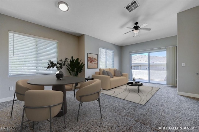 701 Peachy Canyon Cir Unit 201, Las Vegas, NV 89144 - carpeted living room featuring baseboards and ceiling fan