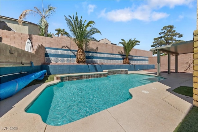 view of pool featuring a fenced backyard and a patio