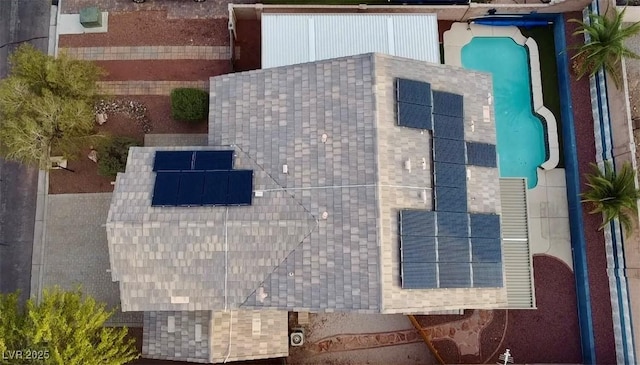 view from above of property with a pool area