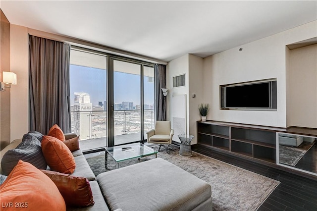 4381 W Flamingo Rd Unit 3206, Las Vegas, NV 89103 - living room with wood finished floors and floor to ceiling windows
