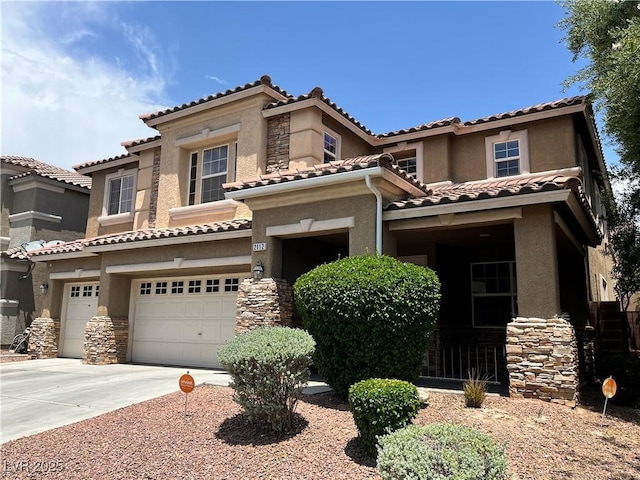 2112 Merganser Ct, North Las Vegas, NV 89084 - view of front of house with stucco siding, stone siding, an attached garage, and a tile roof