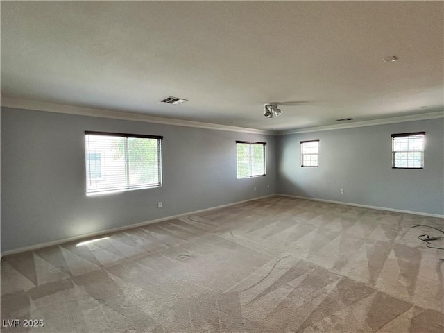 2112 Merganser Ct, North Las Vegas, NV 89084 - unfurnished room with ornamental molding, light carpet, and baseboards