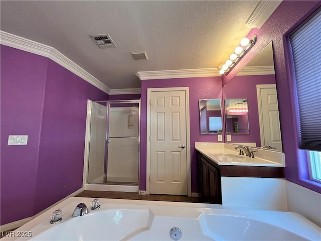 2112 Merganser Ct, North Las Vegas, NV 89084 - full bathroom featuring a bath, crown molding, vanity, a stall shower, and a textured ceiling