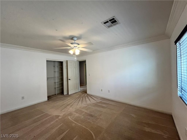 2112 Merganser Ct, North Las Vegas, NV 89084 - unfurnished bedroom with crown molding, baseboards, carpet flooring, a closet, and ceiling fan