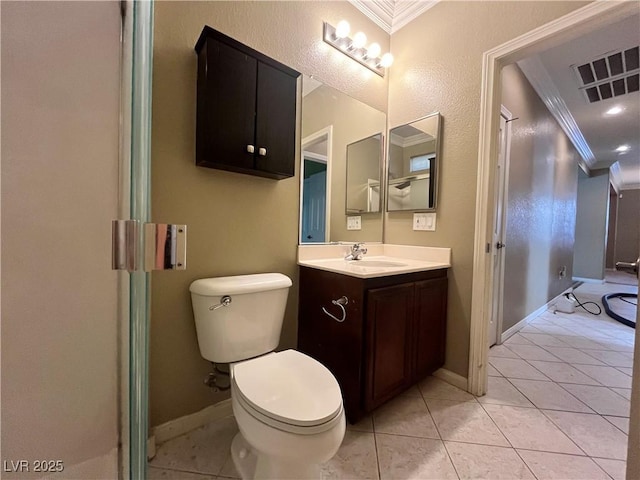 2112 Merganser Ct, North Las Vegas, NV 89084 - full bath with ornamental molding, vanity, toilet, tile patterned flooring, and baseboards
