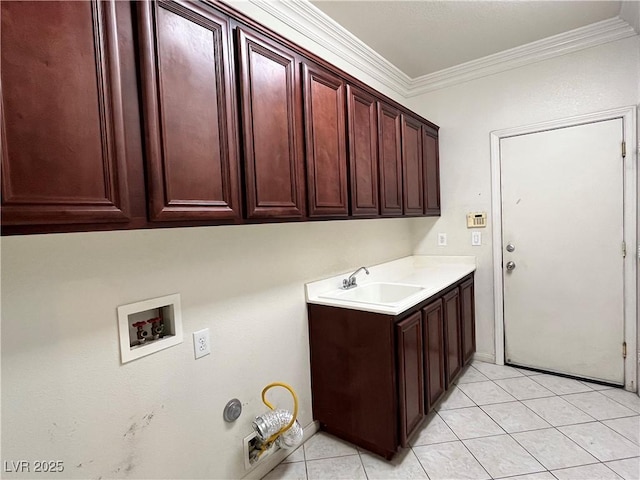 2112 Merganser Ct, North Las Vegas, NV 89084 - laundry area with cabinet space, crown molding, hookup for a washing machine, light tile patterned flooring, and baseboards
