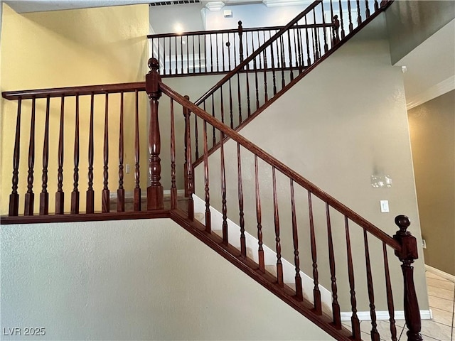 2112 Merganser Ct, North Las Vegas, NV 89084 - stairs with baseboards and ornamental molding