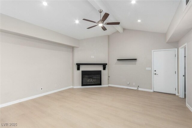 3246 Brookfield Dr, Las Vegas, NV 89120 - unfurnished living room featuring a ceiling fan, light wood finished floors, a glass covered fireplace, baseboards, and recessed lighting