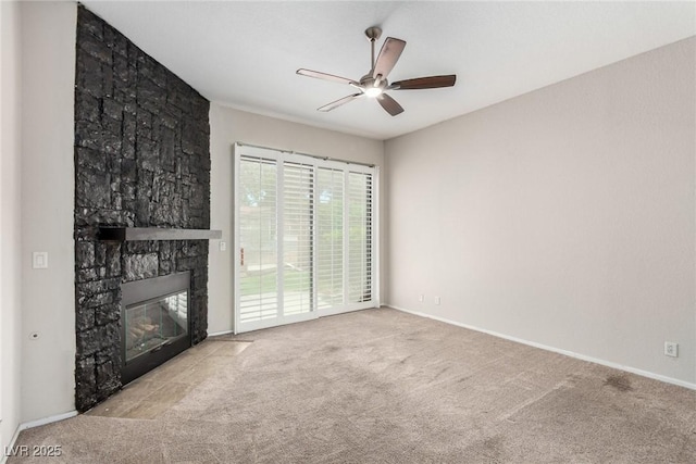 3246 Brookfield Dr, Las Vegas, NV 89120 - unfurnished living room featuring carpet flooring, a ceiling fan, a fireplace, and baseboards
