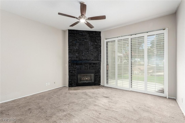3246 Brookfield Dr, Las Vegas, NV 89120 - unfurnished living room featuring a ceiling fan, carpet floors, a fireplace, and baseboards