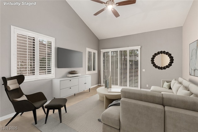 3246 Brookfield Dr, Las Vegas, NV 89120 - living room featuring a ceiling fan, high vaulted ceiling, and light colored carpet