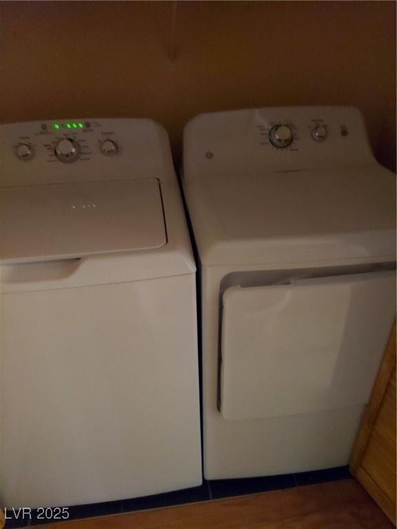 laundry room featuring washer and clothes dryer